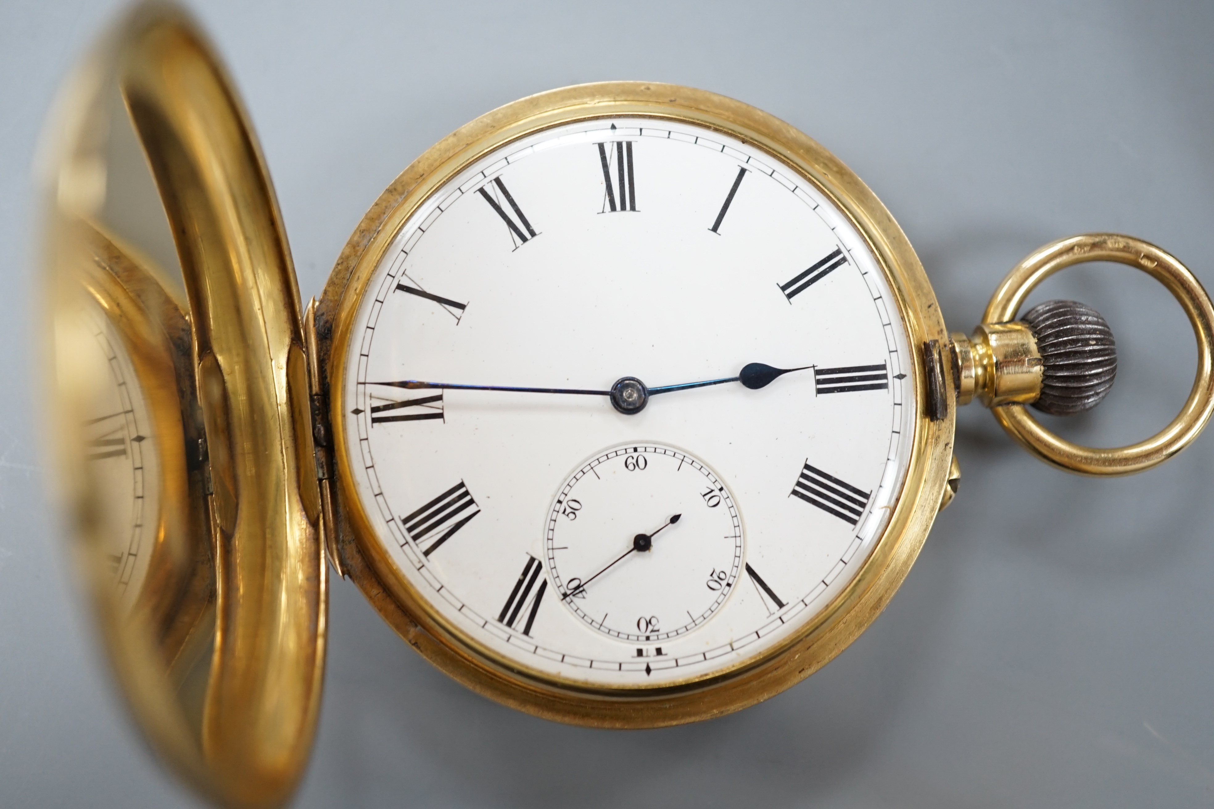 A Swiss 18k yellow metal keyless hunter pocket watch, with Roman dial and subsidiary seconds, case diameter 52mm, gross 121.8 grams, in fitted case.